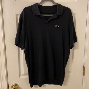 Oakley mens black polo. Size large.